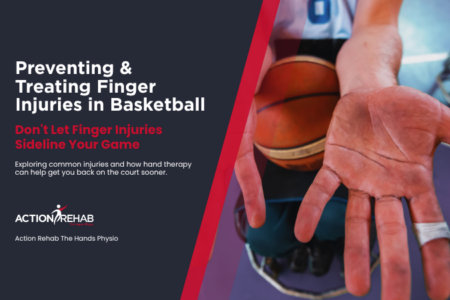 Close-up of a basketball player’s hand with taped fingers holding a basketball, illustrating common finger injuries in basketball and the need for hand physiotherapy treatment.